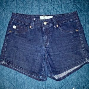 17 / 21 : Asymmetrical Dark Wash Denim Shorts
